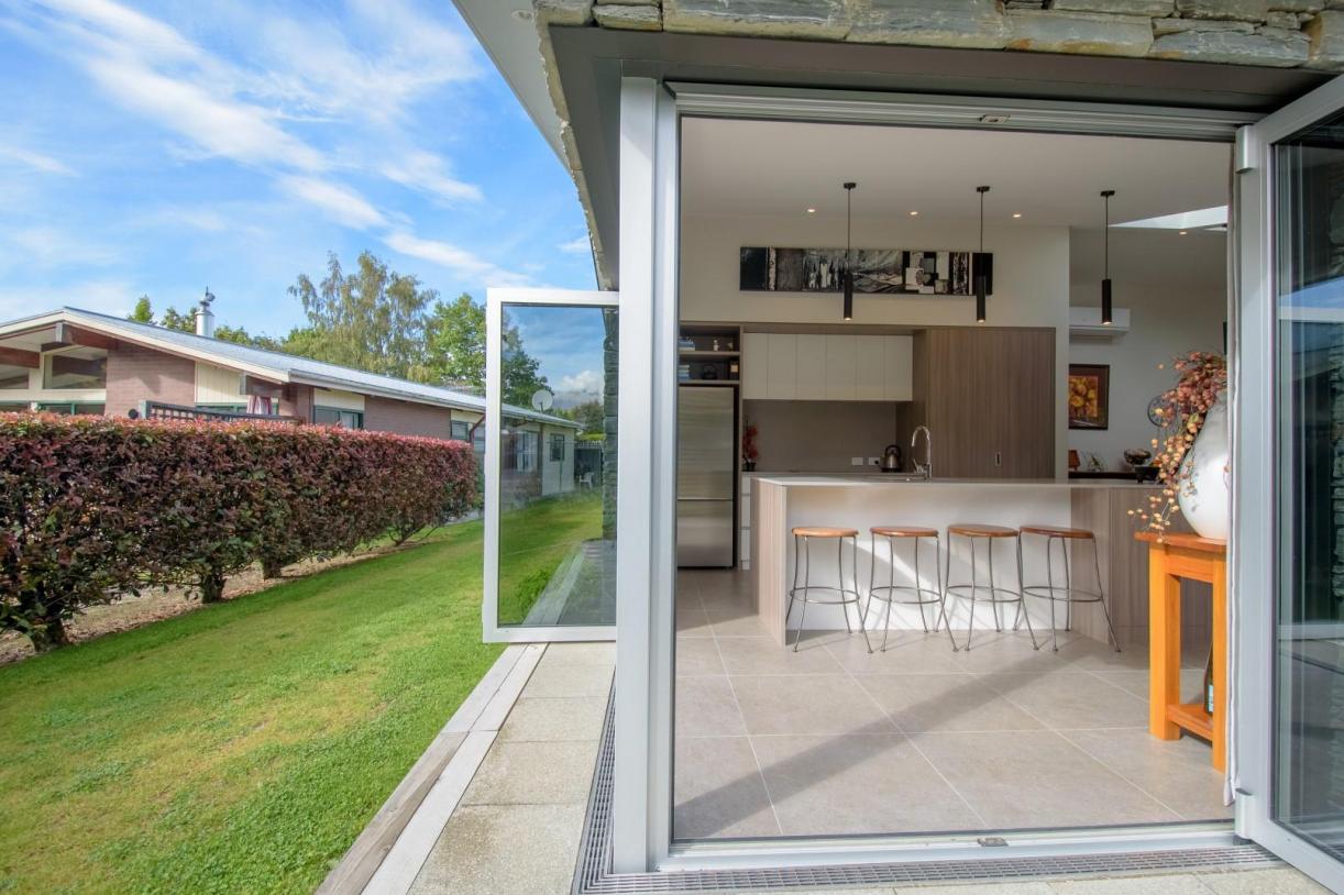 sliding door open looking into kitchen